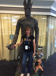 Author Stacey Longo hanging out with Groot and Rocket.